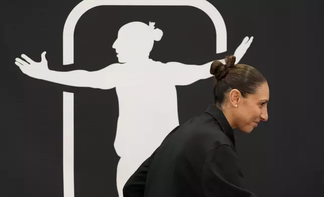 Former Phoenix Mercury player Diana Taurasi arrives for her retirement news conference, Thursday, March 13, 2025, in Phoenix. (AP Photo/Matt York)