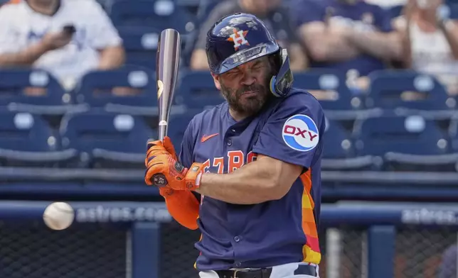 Houston Astros' Jose Altuve takes a ball inside during the first inning of a spring training baseball game against the St. Louis Cardinals Friday, Feb. 28, 2025, in West Palm Beach, Fla. (AP Photo/Jeff Roberson)