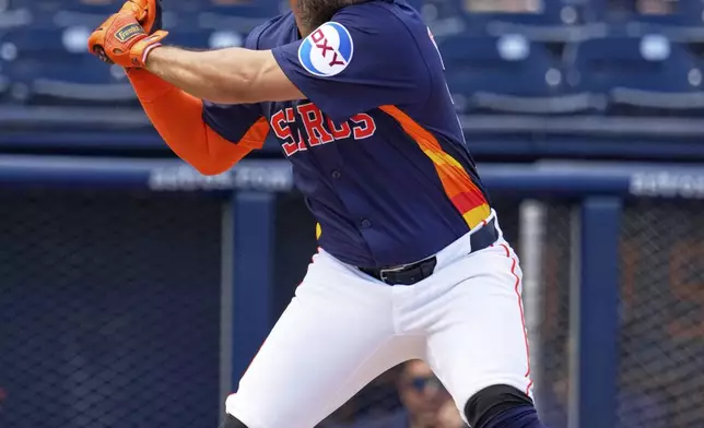 Houston Astros' Jose Altuve bats during the first inning of a spring training baseball game against the St. Louis Cardinals Friday, Feb. 28, 2025, in West Palm Beach, Fla. (AP Photo/Jeff Roberson)