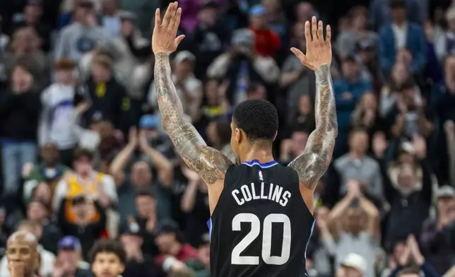 Utah Jazz forward John Collins (20) celebrates as his team defeats the Minnesota Timberwolves in an NBA basketball game Friday, Feb. 28, 2025, in Salt Lake City. (AP Photo/Rick Egan)