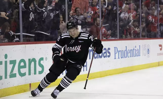 New Jersey Devils right wing Timo Meier reacts after scoring a goal during the second period of an NHL hockey game against the Columbus Blue Jackets, Tuesday, March 11, 2025, in Newark, N.J. (AP Photo/Adam Hunger)