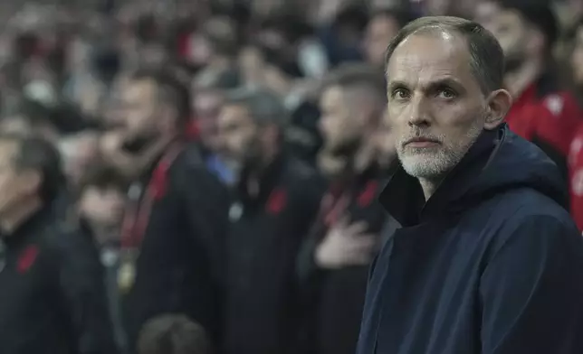 England coach Thomas Tuchel watches on the bench during a World Cup qualifying soccer match between England and Albania at Wembley stadium in London, Friday, March 21, 2025. (AP Photo/Alastair Grant)