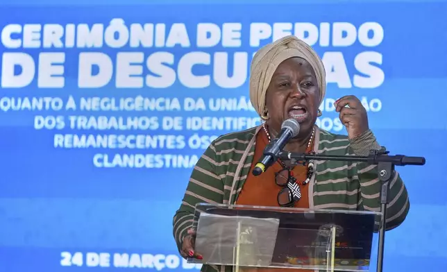 Brazilian Minister of Human Rights Macae Evaristo speaks at a government ceremony to apologize to families of victims of the country's military dictatorship (1964-1985) at the Dom Bosco cemetery in Sao Paulo, Monday, March 24, 2025. (AP Photo/Andre Penner)