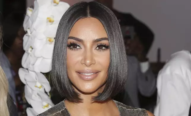 FILE - Kim Kardashian arrives to the Serena Williams fashion show during Fashion Week in New York, Sept. 10, 2019. (AP Photo/Seth Wenig, File)