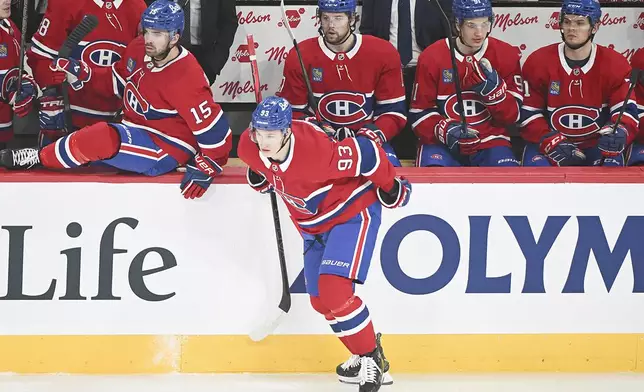Montreal Canadiens' Ivan Demidov (93) comes off the bench during first-period NHL hockey game action against the Chicago Blackhawks in Montreal, Monday, April 14, 2025. (Graham Hughes/The Canadian Press via AP)