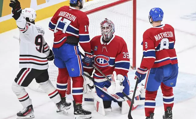 Montreal Canadiens goaltender Sam Montembeault (35) looks on after being scored against by Chicago Blackhawks' Frank Nazar (not shown) during second-period NHL hockey game action in Montreal, Monday, April 14, 2025. (Graham Hughes/The Canadian Press via AP)
