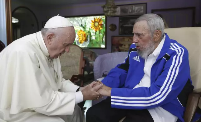 FILE - Pope Francis, left, meets Fidel Castro in Havana, Cuba, Sunday, Sept. 20, 2015. (AP Photo/Alex Castro, file)