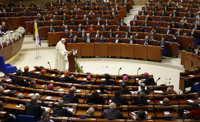 FILE - Pope Francis delivers his speech at the European Council in Strasbourg, France, Tuesday, Nov. 25, 2014. (AP Photo/Andrew Medichini, file)