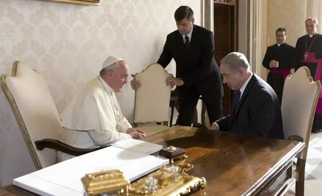 FILE - Pope Francis meets Israeli Prime Minister Benjamin Netanyahu, at the Vatican, Monday, Dec. 2, 2013. (AP Photo/Alessandra Tarantino, Pool, File)