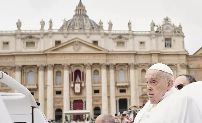 Pope Francis tours St. Peter's Square in his popemobile after bestowing the Urbi et Orbi (Latin for to the city and to the world) blessing at the end of the Easter mass presided over by Cardinal Angelo Comastri in St. Peter's Square at the Vatican Sunday, April 20, 2025.(AP Photo/Andrew Medichini)