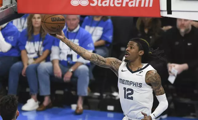 Memphis Grizzlies guard Ja Morant shoots during the first half in Game 1 of an NBA first-round playoff series against the Oklahoma City Thunder, Tuesday, April 22, 2025, in Oklahoma City. (AP Photo/Kyle Phillips)