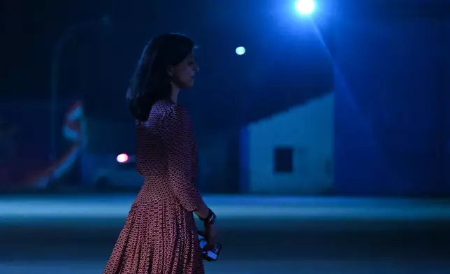 Second lady Usha Vance walks across the tarmac to Air Force Two, en route to Jaipur, India, after spending the day in New Delhi with her husband, U.S. Vice President JD Vance and their family, Monday, April 21, 2025. (Kenny Holston/The New York Times via AP, Pool)