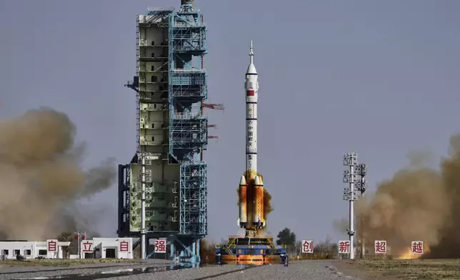 China's Long March 2F rocket, carrying three astronauts for the Shenzhou 20 manned space mission, blasts off at the Jiuquan Satellite Launch Center in Jiuquan, northwestern China, Thursday, April 24, 2025. (AP Photo/Andy Wong)