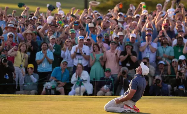Rory McIlroy, of Northern Ireland, reacts after winning in a playoff against Justin Rose after the final round at the Masters golf tournament, Sunday, April 13, 2025, in Augusta, Ga. (AP Photo/Ashley Landis)