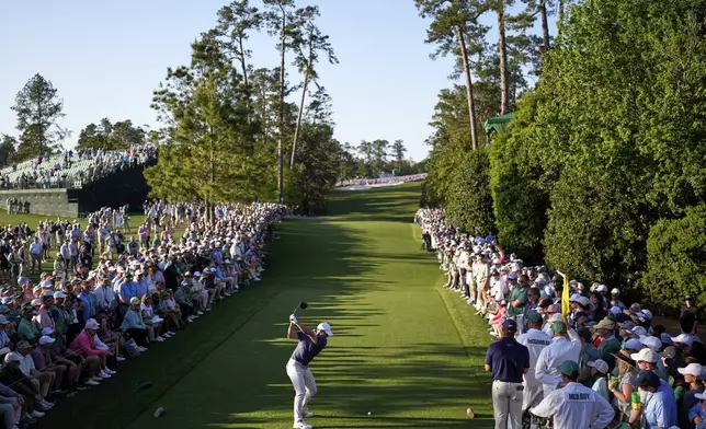 Rory McIlroy, of Northern Ireland, hits his tee shot on the 18th hole during the final round at the Masters golf tournament, Sunday, April 13, 2025, in Augusta, Ga. (AP Photo/George Walker IV)