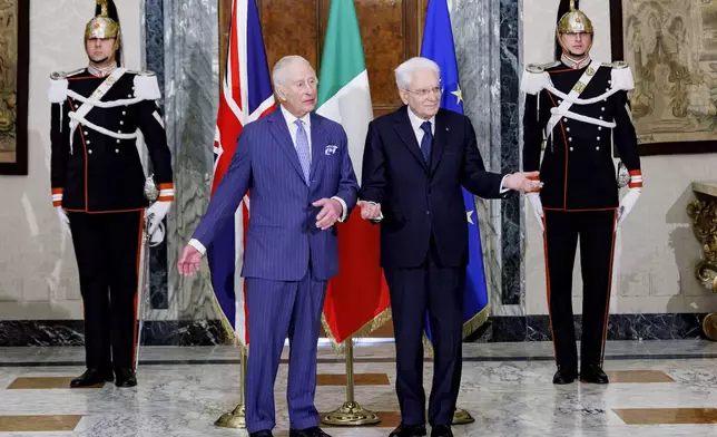 Italian President Sergio Mattarella, center right, and Britain's King Charles III gesture on the occasion of their meeting at the Quirinale Presidential Palace, in Rome, Tuesday, April 8, 2025 (Roberto Monaldo/LaPresse via AP)