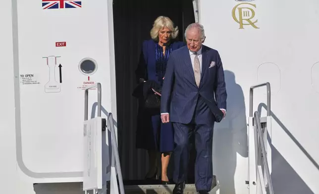 King Charles III, right, and Queen Camilla arrive at Rome's Iternational Airport G.B. Pastine in Ciampino, for a four-day official visit, Monday, April 7, 2025. (AP Photo/Andrew Medichini)