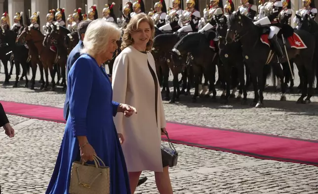 Queen Camilla arrives at the Quirinale Presidential Palace to meet with Italy's President Sergio Mattarella, in Rome, Tuesday, April 8, 2025. (AP Photo/Alessandra Tarantino)