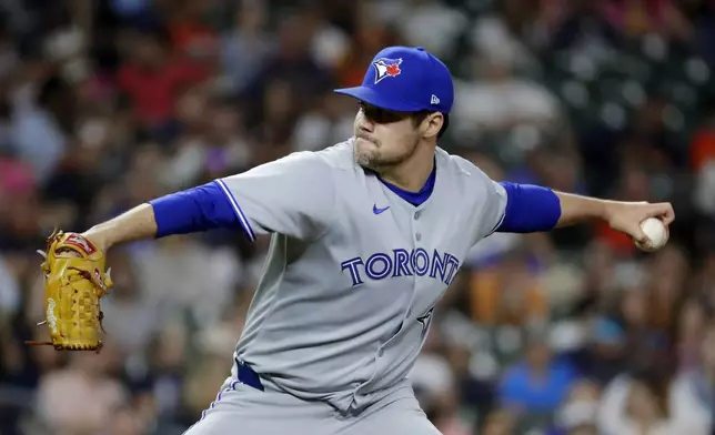 Toronto Blue Jays relief pitcher Brendon Little throws against the Houston Astros during the sixth inning of a baseball game Tuesday, April 22, 2025, in Houston. (AP Photo/Michael Wyke)