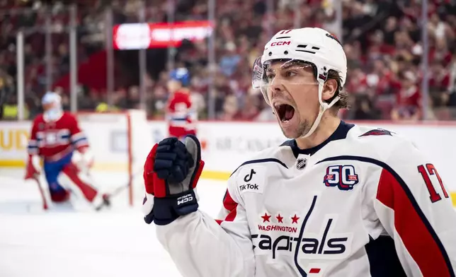 Washington Capitals' Dylan Strome (17) celebrates after his goal against the Montreal Canadiens during the second period of Game 4 in an NHL hockey first-round playoff series in Montreal, Sunday, April 27, 2025. (Christopher Katsarov/The Canadian Press via AP)