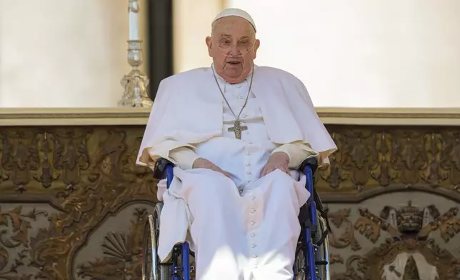 FILE - Pope Francis arrives at the end of a mass in St. Peter's Square at The Vatican, Sunday, April 6, 2025, part of the jubilee of the sick and the health workers. (AP Photo/Andrew Medichini, File)