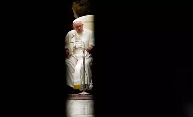 FILE - Pope Francis holds his weekly general audience in the Paul VI hall, at the Vatican, Wednesday, Jan. 2, 2019. (AP Photo/Andrew Medichini, file)