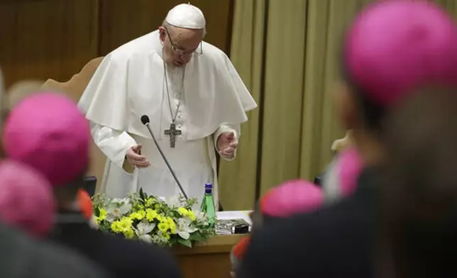 FILE - Pope Francis prays at the beginning of the third day of a Vatican's conference on dealing with sex abuse by priests, at the Vatican, Saturday, Feb. 23, 2019. (AP Photo/Alessandra Tarantino, Pool, file)