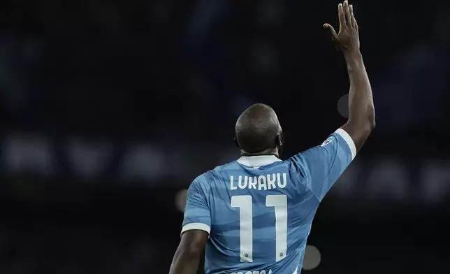 Napoli's Romelu Lukaku celebrates after scoring during the Serie A soccer match between Napoli and Empoli at the Diego Armando Maradona Stadium in Naples, Italy, Monday, April 14 , 2025. (Alessandro Garofalo/LaPresse via AP)