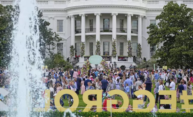 Guests arrive on the South Lawn of the White House before President Donald Trump and first lady Melania Trump participate in the White House Easter Egg Roll Monday, April 21, 2025, in Washington. (AP Photo/Alex Brandon)