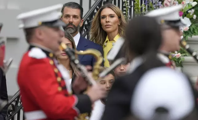 Donald Trump Jr., and his girlfriend Bettina Anderson arrive for the White House Easter Egg Roll on the South Lawn of the White House, Monday, April 21, 2025, in Washington. (AP Photo/Alex Brandon)
