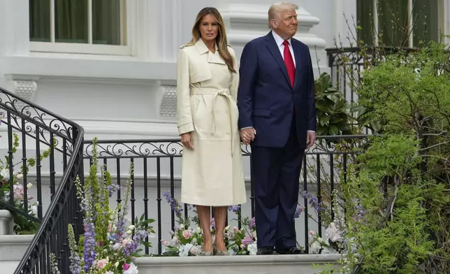 President Donald Trump and first lady Melania Trump arrive for the White House Easter Egg Roll on the South Lawn of the White House, Monday, April 21, 2025, in Washington. (AP Photo/Alex Brandon)