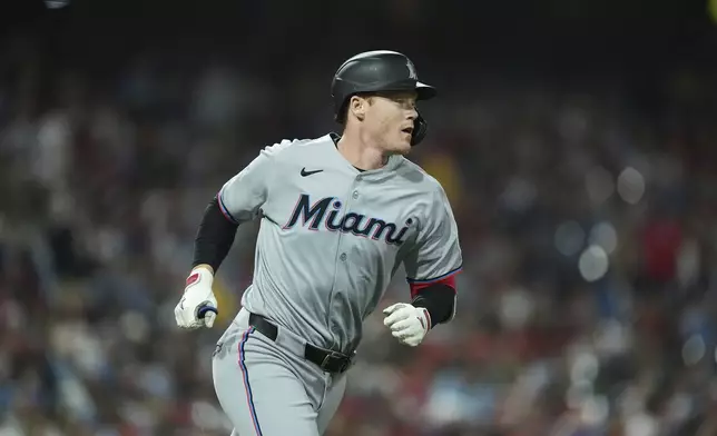 Miami Marlins' Eric Wagaman runs the bases after hitting a two-run home run off Philadelphia Phillies pitcher Zack Wheeler during the sixth inning of a baseball game, Friday, April 18, 2025, in Philadelphia. (AP Photo/Matt Rourke)