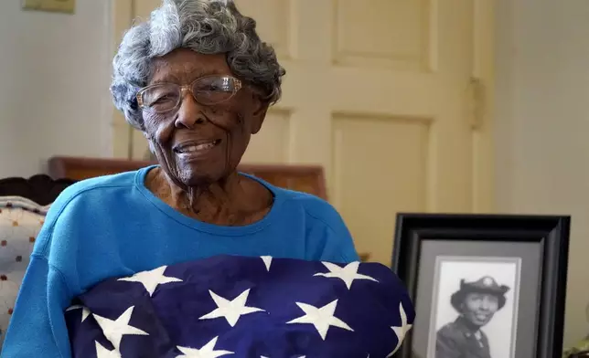 FILE - World War II veteran Maj. Fannie Griffin McClendon, a member of the World War II 6888th Central Postal Directory Battalion, poses for a photo at her home on June 10, 2021, in Tempe, Ariz. (AP Photo/Matt York, File)