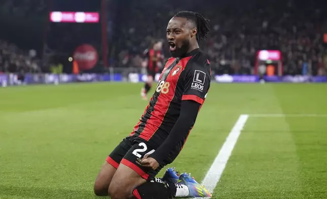 Bournemouth's Antoine Semenyo celebrates after scoring their side's first goal of the game during the English Premier League soccer match between Bournemouth and Fulham at the Vitality Stadium, Bournemouth, England, Monday, April 14, 2025. (John Walton/PA via AP)