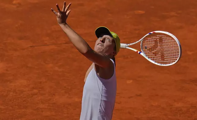 Poland's Iga Swiatek competes against Alexandra Eala of Philippines during the Madrid Open tennis tournament in Madrid, Spain, Thursday, April 24, 2025. (AP Photo/Manu Fernandez)