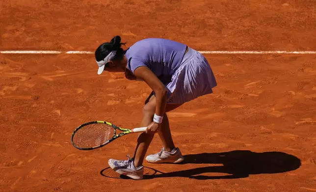Alexandra Eala of the Philippines celebrates a point during her match against Poland's Iga Swiatek during the Madrid Open tennis tournament in Madrid, Spain, Thursday, April 24, 2025. (AP Photo/Manu Fernandez)