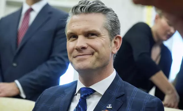 Secretary of Defense Pete Hegseth listens as President Donald Trump meets with Norwegian Prime Minister Jonas Gahr Støre during a bilateral meeting in the Oval Office of the White House, Thursday, April 24, 2025, in Washington. (AP Photo/Mark Schiefelbein)
