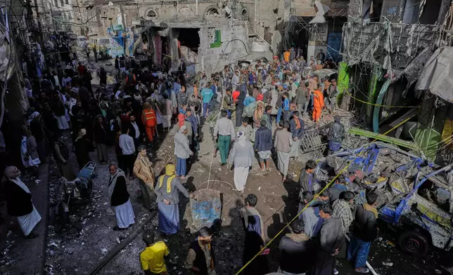 Yemenis crowd at Farwah popular market, which Houthis said was struck by U.S. airstrikes, in Sanaa, Yemen, Monday, April 21, 2025. (AP Photo)