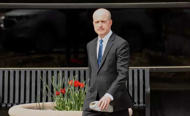 District Attorney Brian Mason walks out of court following the murder conviction of Daniel Krug in Broomfield, Colo., on Thursday, April 17, 2025. (AP Photo/Thomas Peipert)