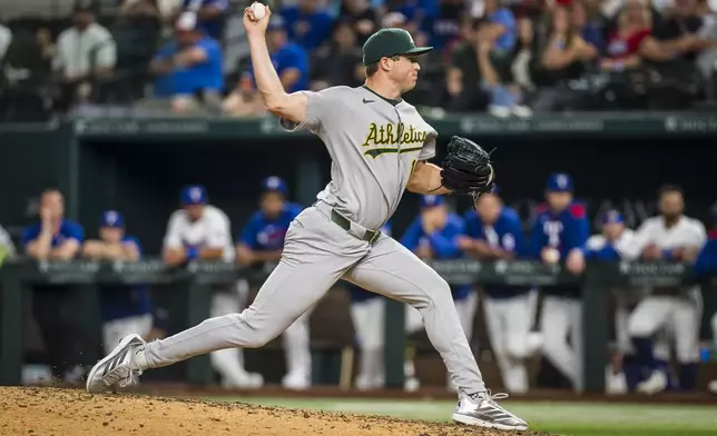 Athletics' Mason Miller pitches during the ninth inning of a baseball game against the Texas Rangers, Monday, April 28, 2025, in Arlington, Texas. (AP Photo/Jessica Tobias)