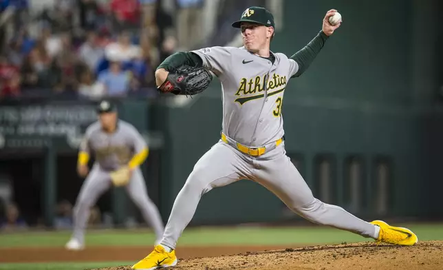 Athletics' J.P. Sears pitches against the Texas Rangers during the fifth inning of a baseball game Monday, April 28, 2025, in Arlington, Texas. (AP Photo/Jessica Tobias)