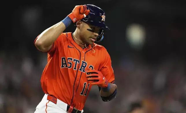 Houston Astros' Cam Smith runs the bases after hitting a home run during the second inning of a baseball game against the San Diego Padres in Houston, Friday, April 18, 2025. Yainer Diaz and Jake Meyers also scored.(AP Photo/Ashley Landis)