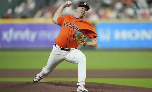 Houston Astros starting pitcher Ryan Gusto throws during the first inning of a baseball game against the San Diego Padres in Houston, Friday, April 18, 2025. (AP Photo/Ashley Landis)