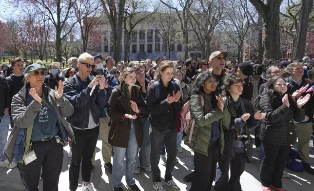 Students, faculty and members of the Harvard University community rally, Thursday, April 17, 2025, in Cambridge, Mass. (AP Photo/Charles Krupa)