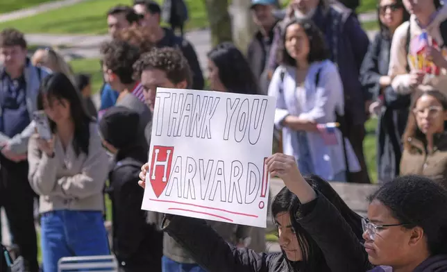 Students, faculty and members of the Harvard University community rally, Thursday, April 17, 2025, in Cambridge, Mass. (AP Photo/Charles Krupa)