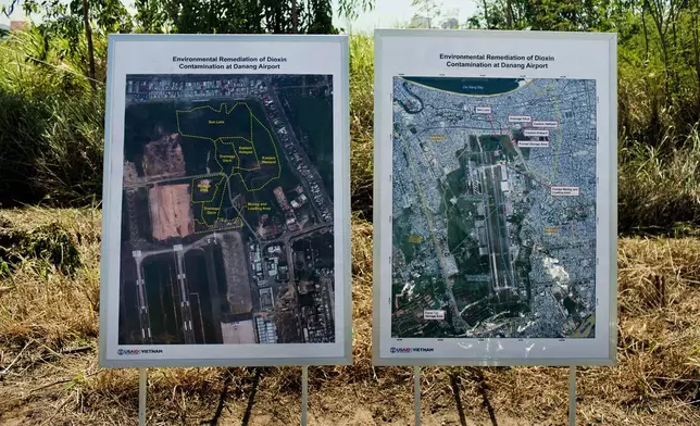 FILE- Maps of the area contaminated with dioxin around Danang airport are displayed during a ceremony marking the start of a project to clean up dioxin left over from the Vietnam War, at a former U.S. military base in Danang, Vietnam Thursday Aug. 9, 2012. (AP Photo/Maika Elan, File)