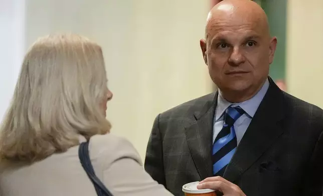 Attornesy Diana Fabi Samson and Arthur Aidala speak outside Harvey Weinstein's retrial in Manhattan Criminal Court, Thursday, April 24, 2025, in New York. (AP Photo/Julia Demaree Nikhinson)