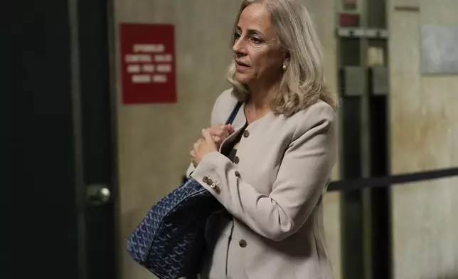 Attorney Diana Fabi Samson arrives for Harvey Weinstein's retrial in Manhattan Criminal Court, Thursday, April 24, 2025, in New York. (AP Photo/Julia Demaree Nikhinson)