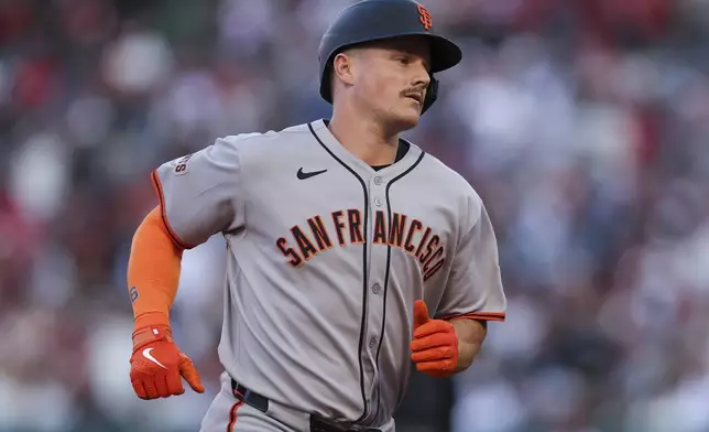San Francisco Giants' Matt Chapman rounds the bases after hitting a home run during the first inning of a baseball game against the Los Angeles Angels in Anaheim, Calif., Saturday, April 19, 2025. (AP Photo/Jessie Alcheh)