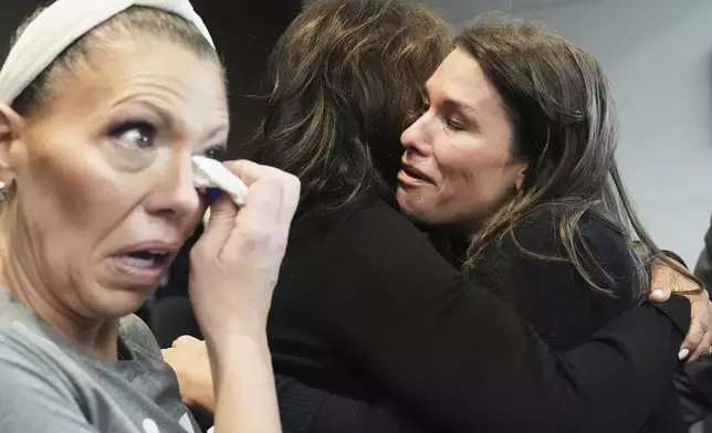 Victims, Keely Roberts, left, Sheila Gutman, center, and Dana Ruder Ring react during the sentencing hearing for Robert E. Crimo III., at the Lake County Courthouse, in Waukegan, Ill., Wednesday, April 23, 2025. (AP Photo/Nam Y. Huh, Pool)